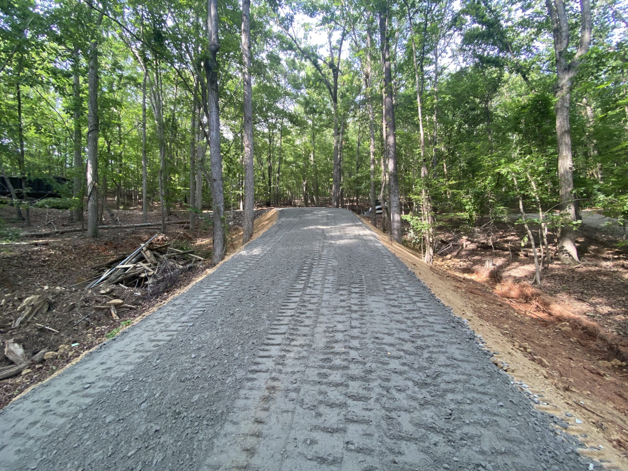 Dump Truck and Michael Anderson, Owner of Trinity Land Services
