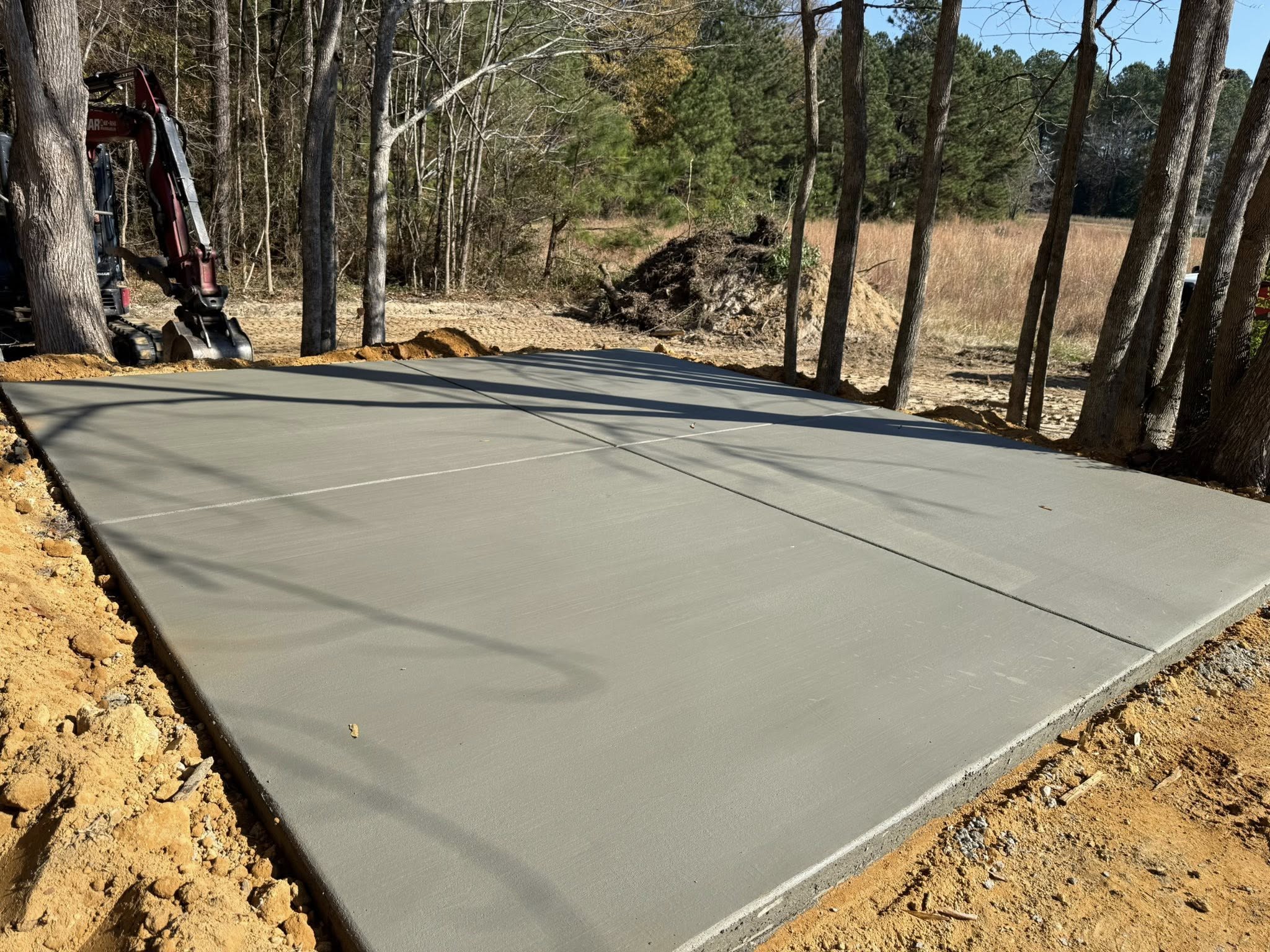 Dump Truck and Michael Anderson, Owner of Trinity Land Services