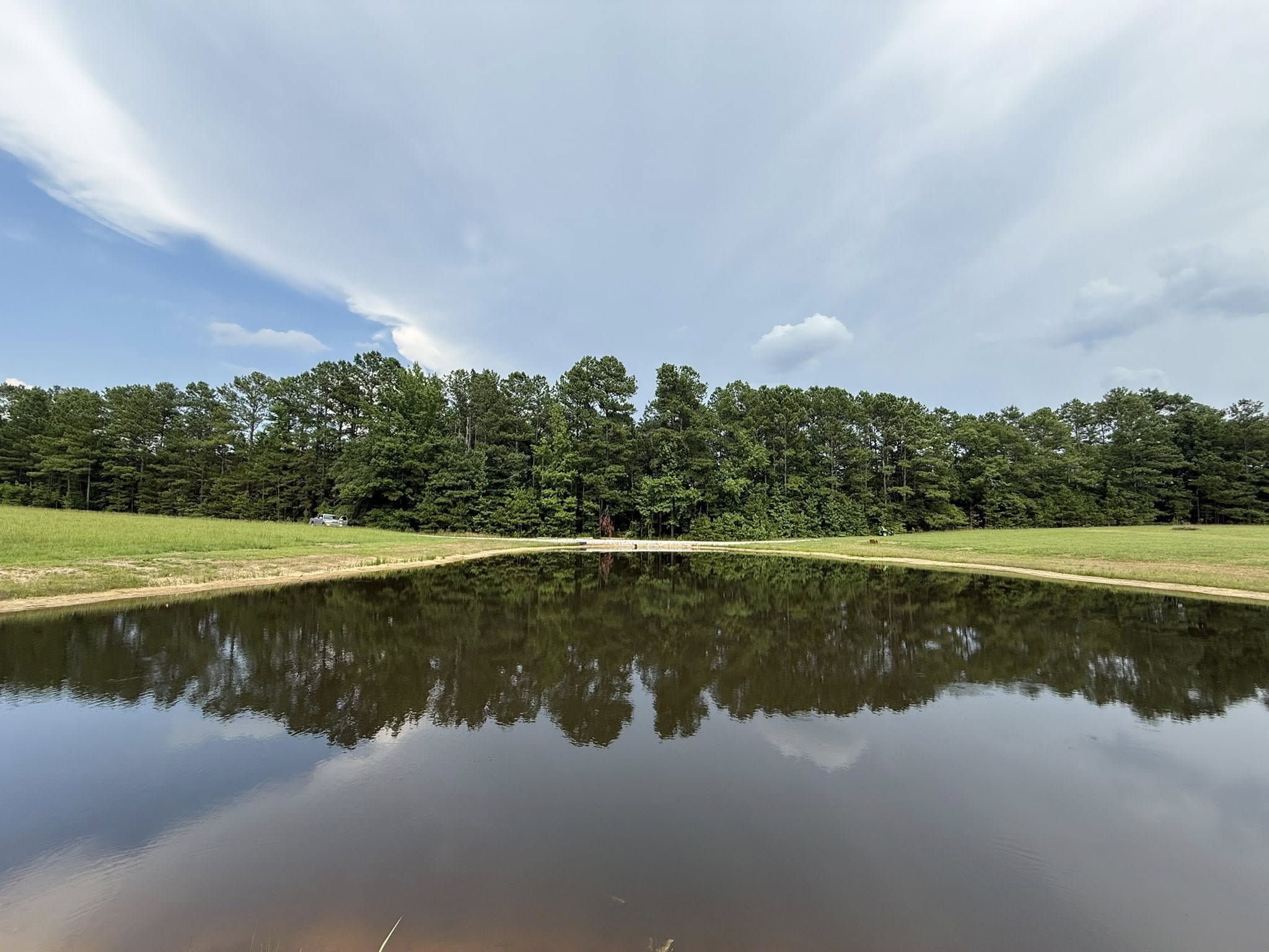 Dump Truck and Michael Anderson, Owner of Trinity Land Services